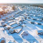 Aerial view of small town covered in snow